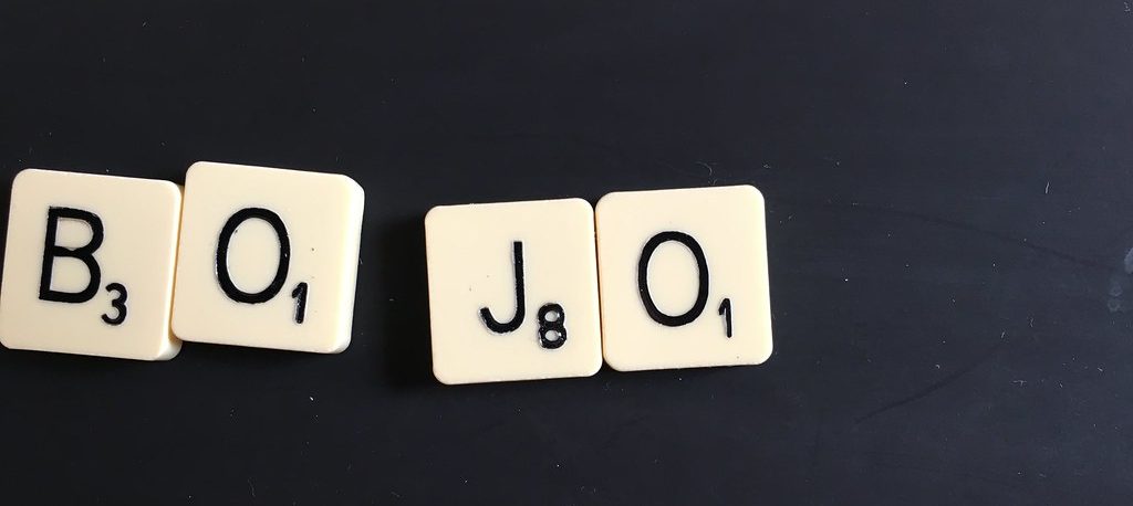 Scrabble tiles spelling out BOJO